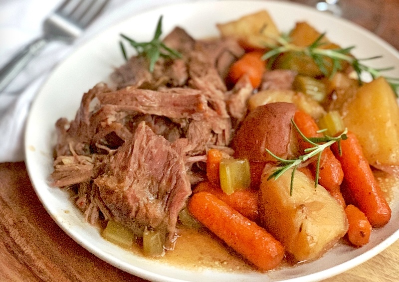 Easy to make slow cooker pot roast made with 3 seasoning packets.