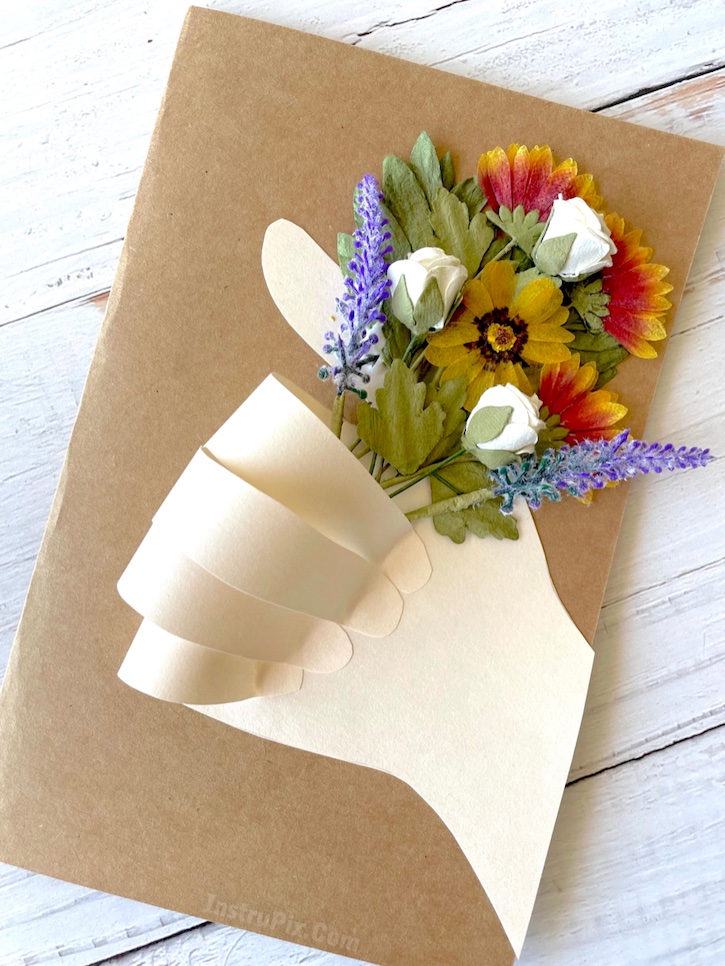 Beautiful flower bouquet wrapped in brown paper. Cute cards